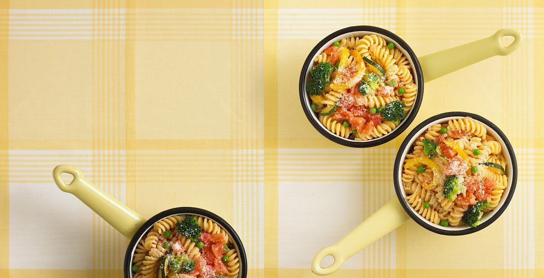 Fusilli with colourful vegetables (view from above)