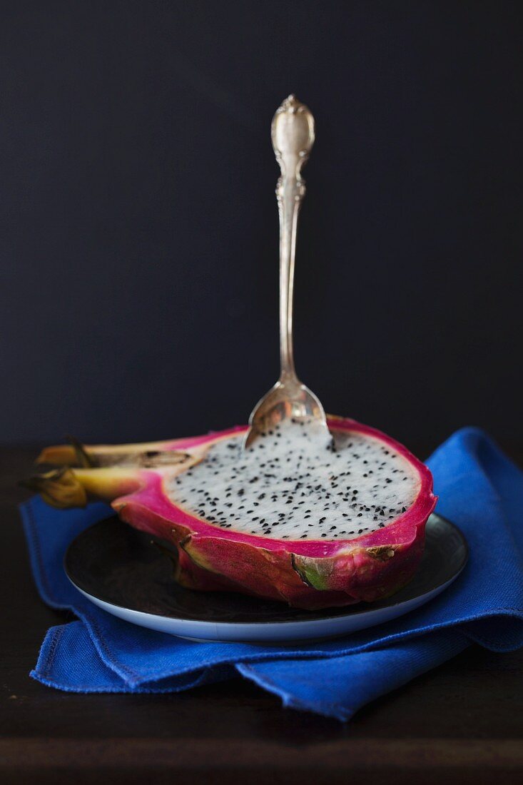 Dragon Fruit with a silver spoon