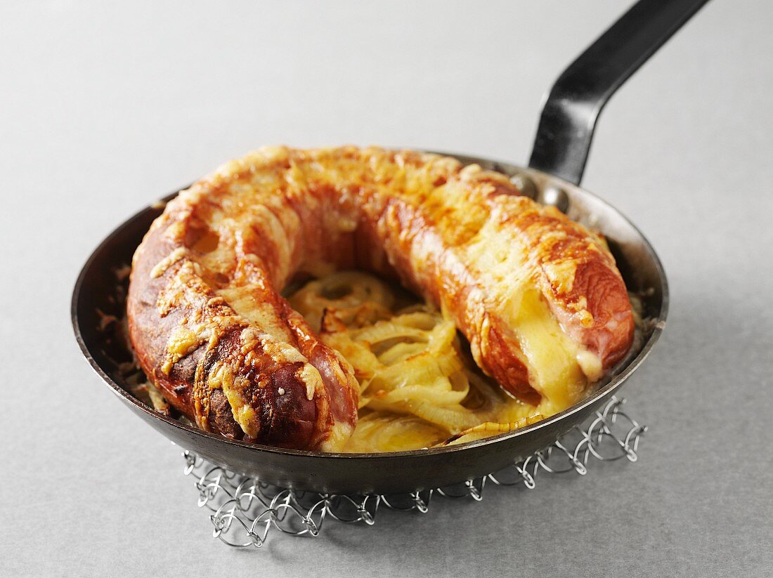Falukorv (sausage ring filled with cheese and baked under the grill, Sweden)