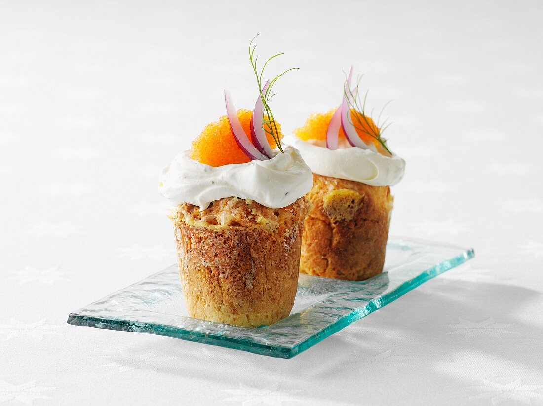 Savoury cheese cupcakes with sour cream and caviar