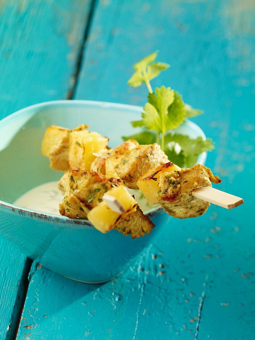 Pineapple and turkey skewers with dip