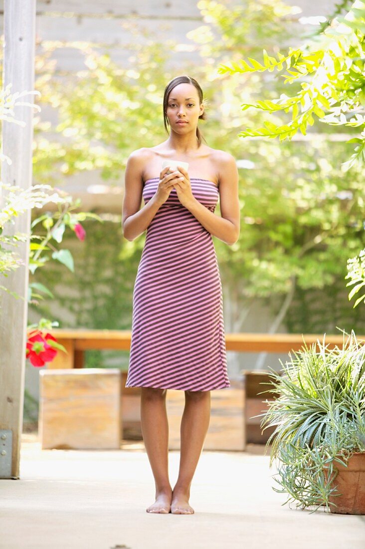 Full length portrait of woman outdoors