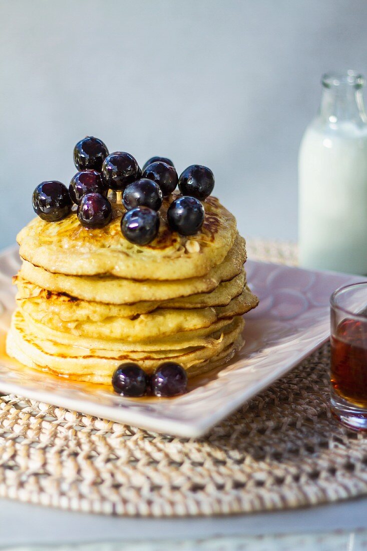 Banana and linseed pancakes with blueberries and agave syrup