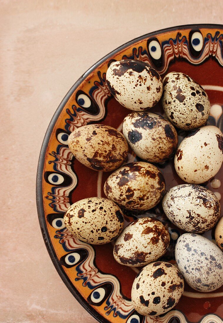 Quail's eggs on a patterned plate