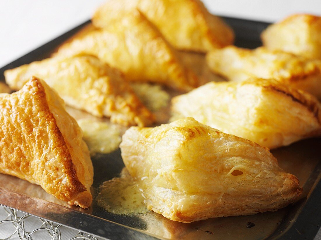 Puff pastry triangles on a baking tray (Sweden)