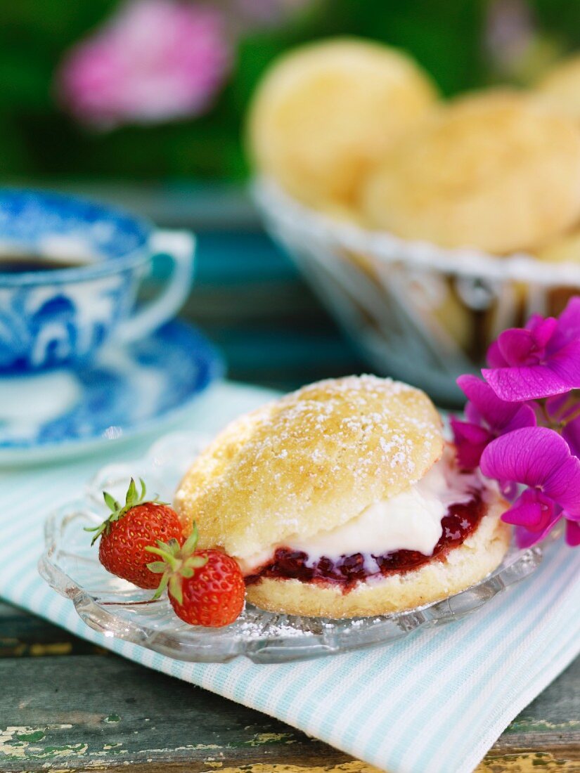 Scone with cream and marmalade