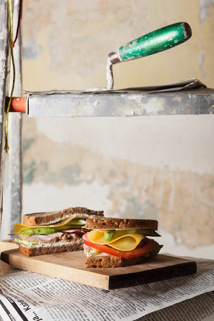 Sandwiches auf einem Baugerüst