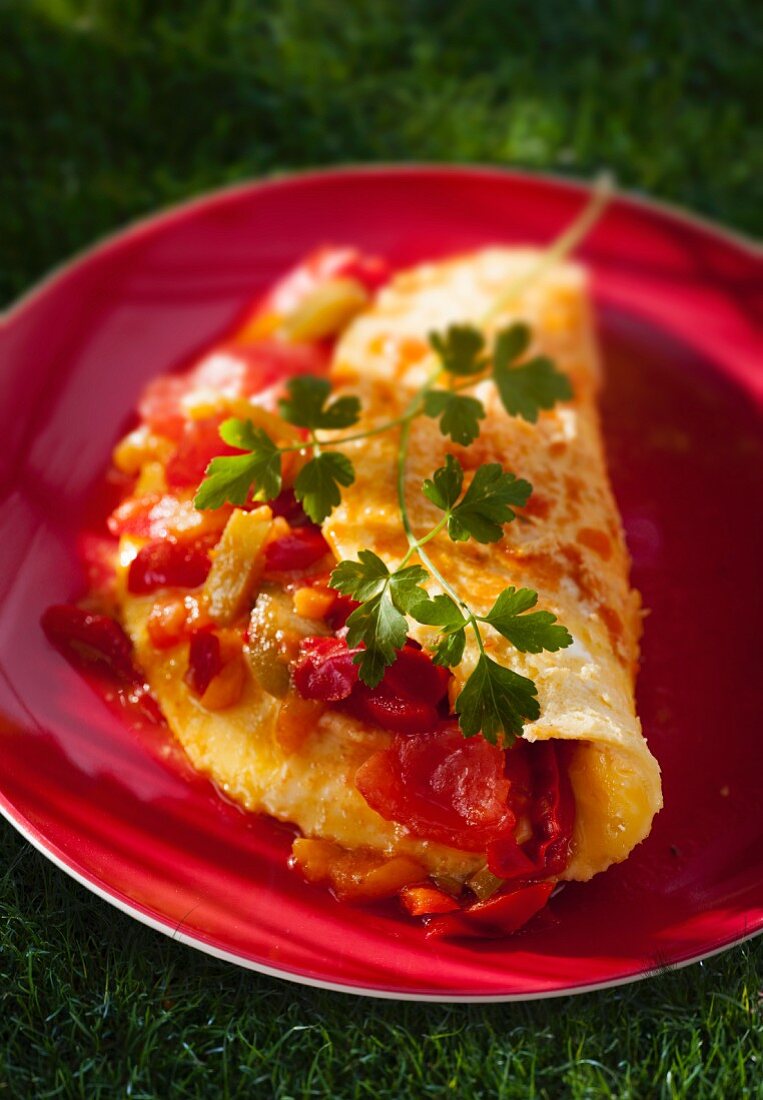 Omelette with tomatoes and parsley