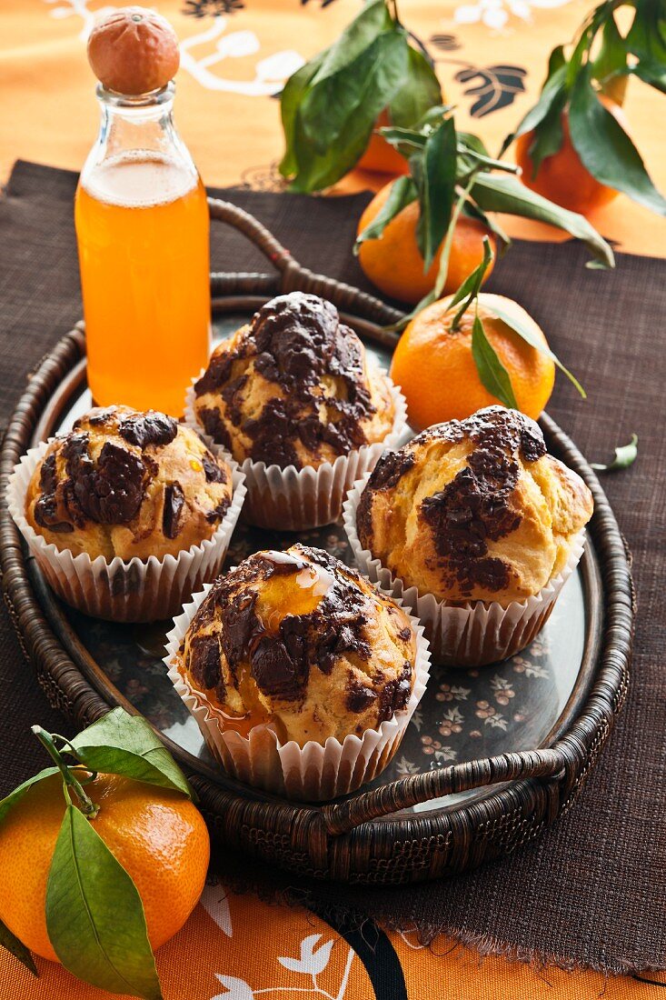 Chocolate muffins with mandarin syrup
