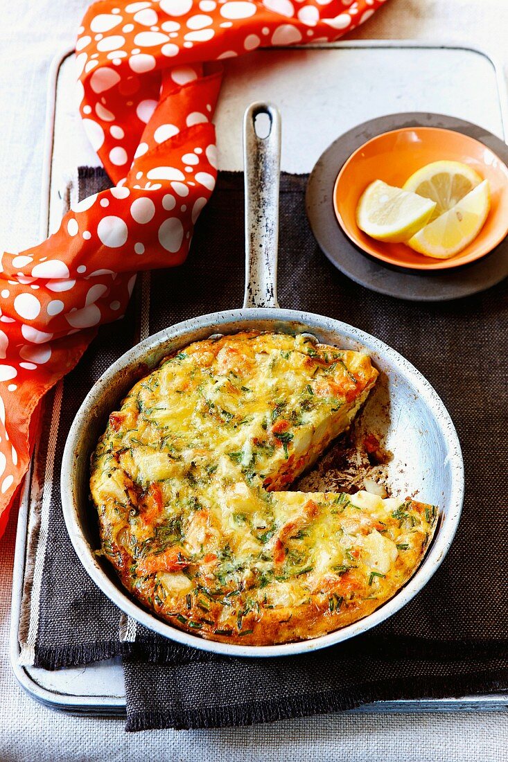 Frittata with salmon, potatoes and chives