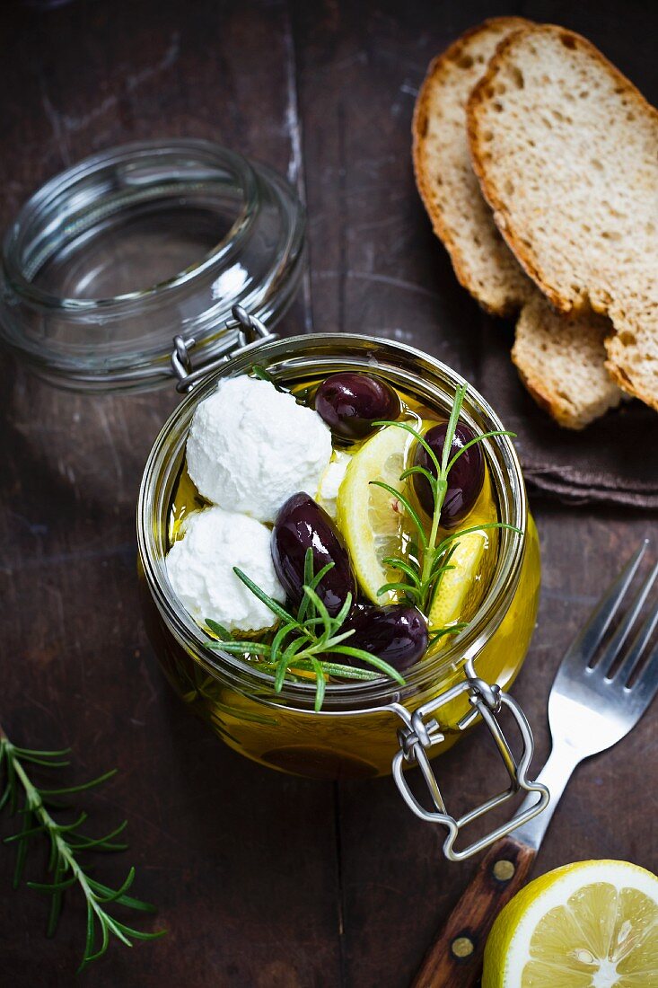 Marinated goat's cheese with lemons and olives
