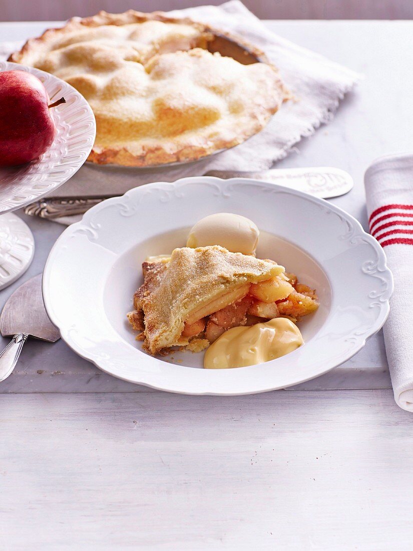 Apple pie with ice cream and vanilla cream