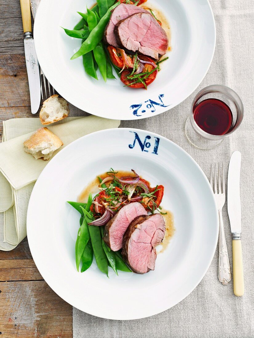 Roast lamb with mange tout and tomatoes, for two