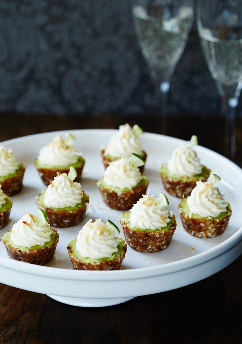 Lime tartlets on a cake stand