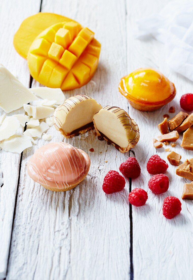 Butterscotch, mango and raspberry tartlets and ingredients