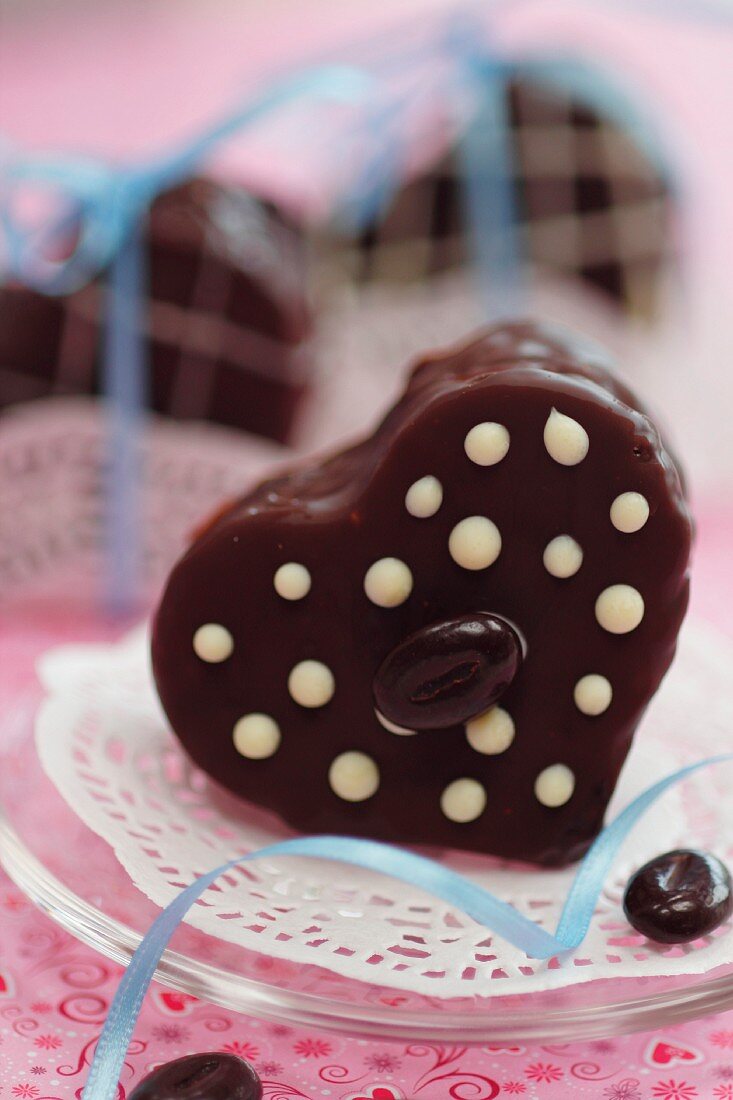 Individual mocha cream cake in the shape of a heart