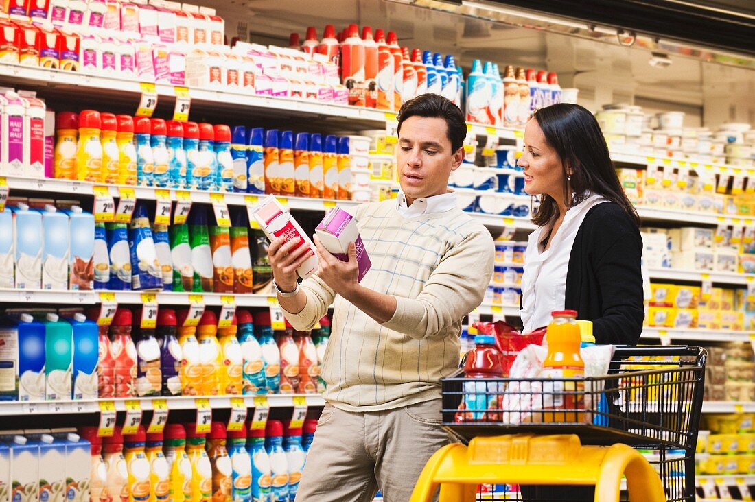 A couple shopping in the supermarket