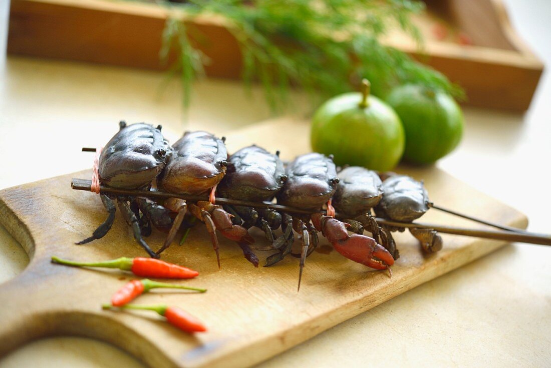 Crayfish skewer, chillies, limes and dill (Thailand)