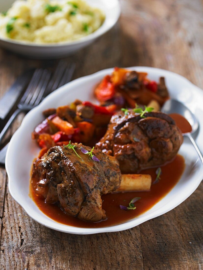 Braised lamb shanks with peppers