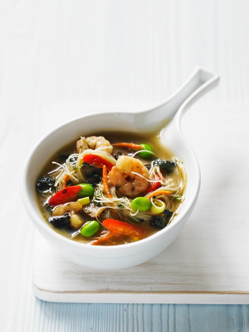 Miso soup with noodles and king prawns (Asia)