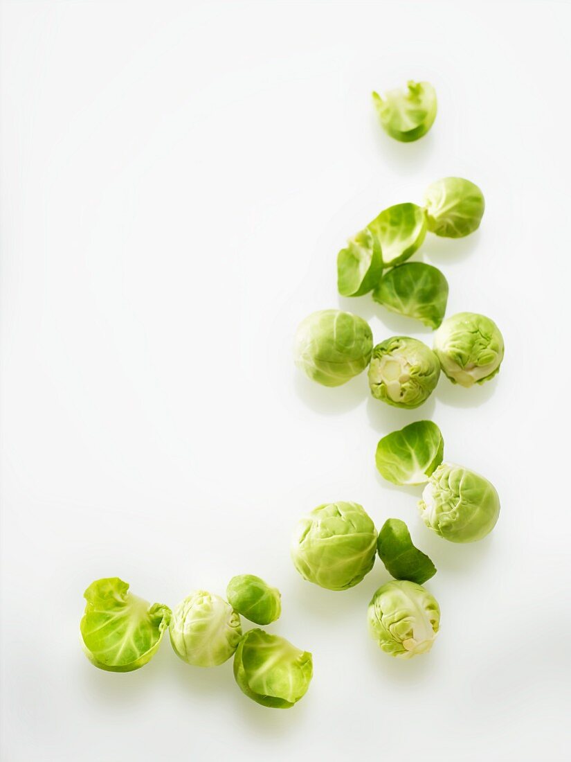 Brussels sprouts on a white surface