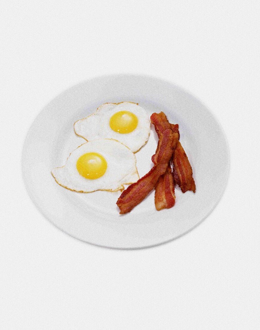 Two Eggs and Bacon on Plate