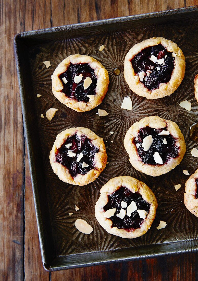 Mini berry tartlets with flaked almonds