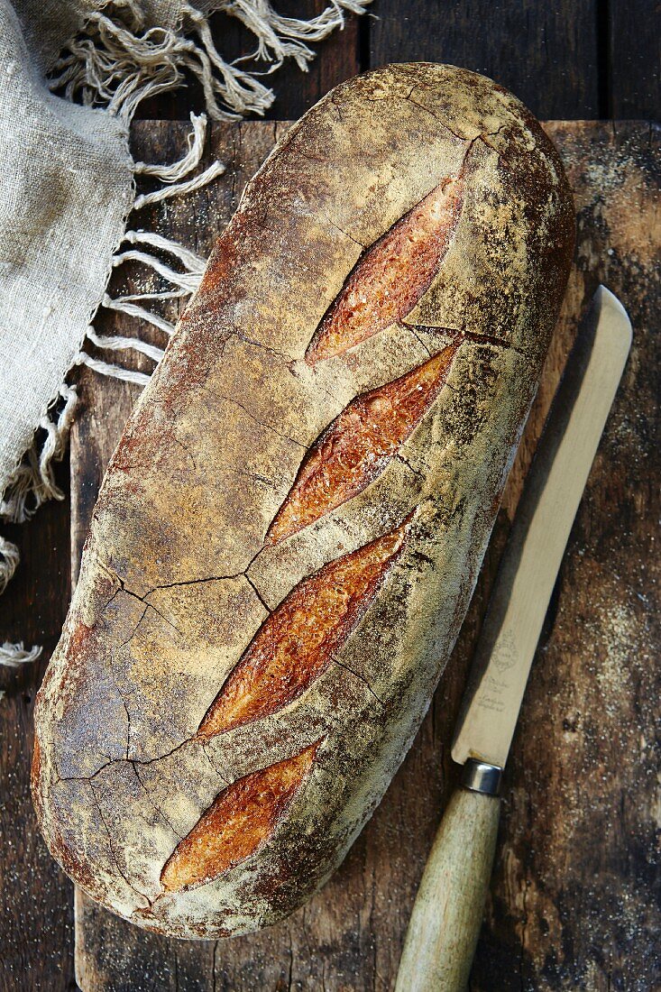 Sourdough bread on a rustic chopping board