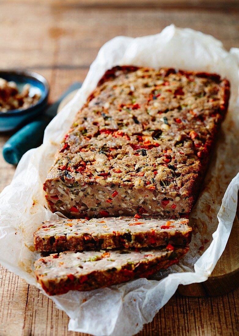 Nut bread with vegetables, partly sliced