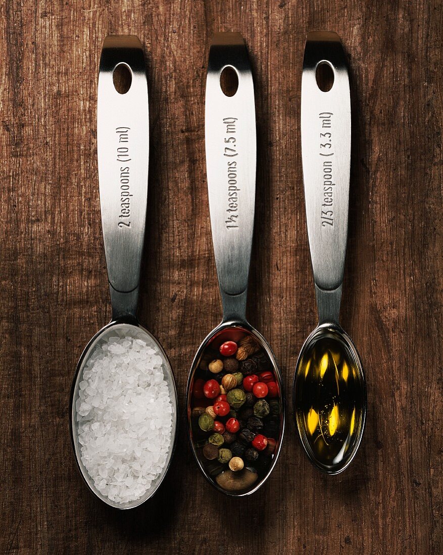 Spoons With Salt, Pepper and Oil