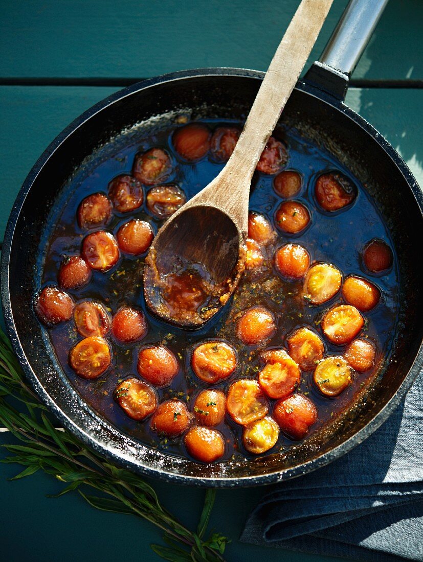 Cocktail tomatoes in a pan