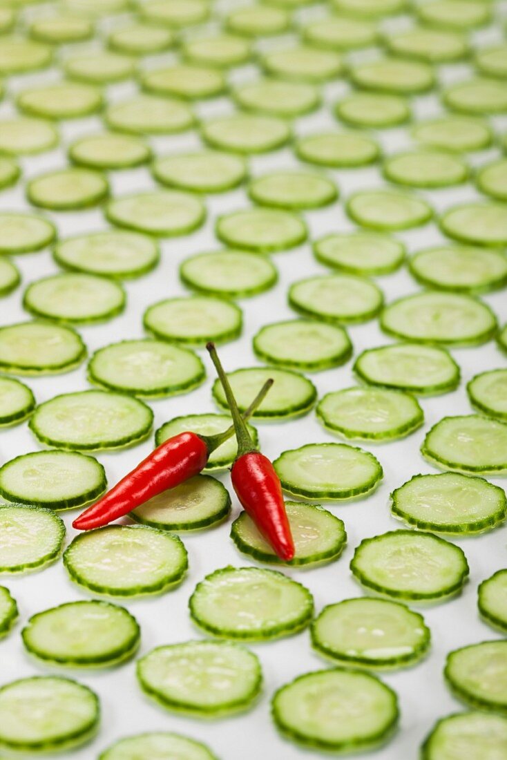 Red Hot Peppers on Cucumber Slices