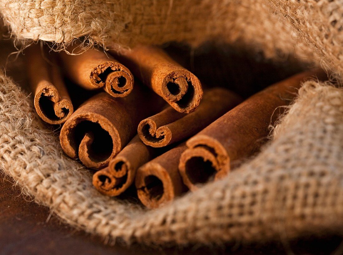 Cinnamon Sticks in Burlap Sack, Close-Up