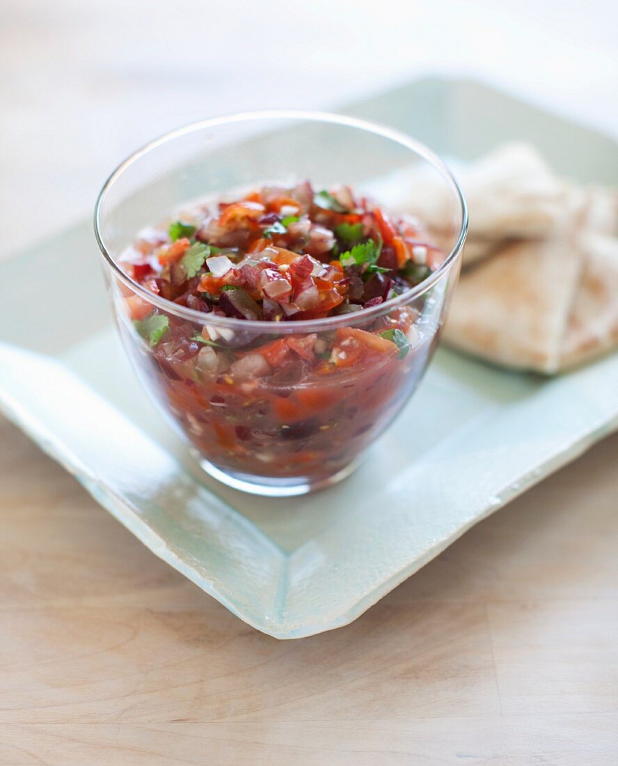 Tomato salsa in a glass bowl
