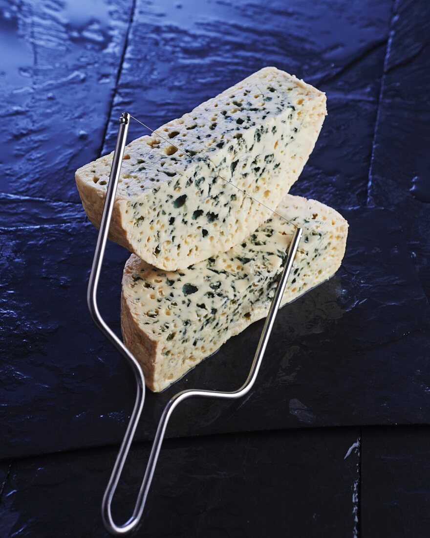 Roquefort and a cheese cutter
