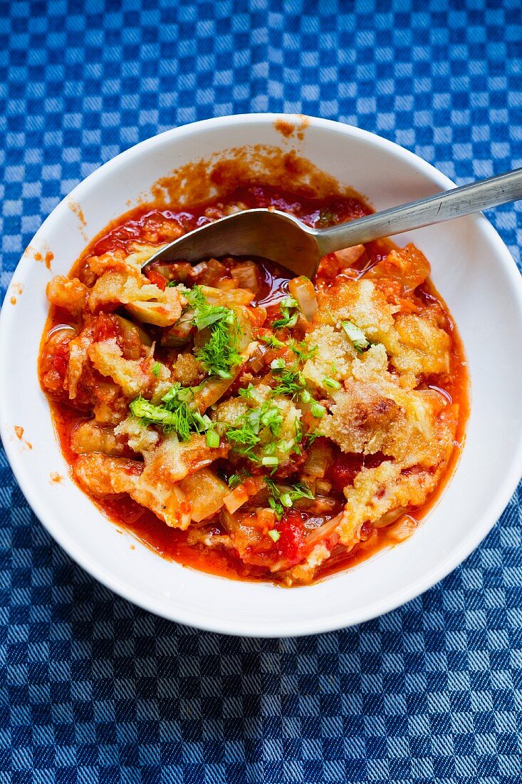 Gratinated fennel with tomato sauce and Parmesan cheese