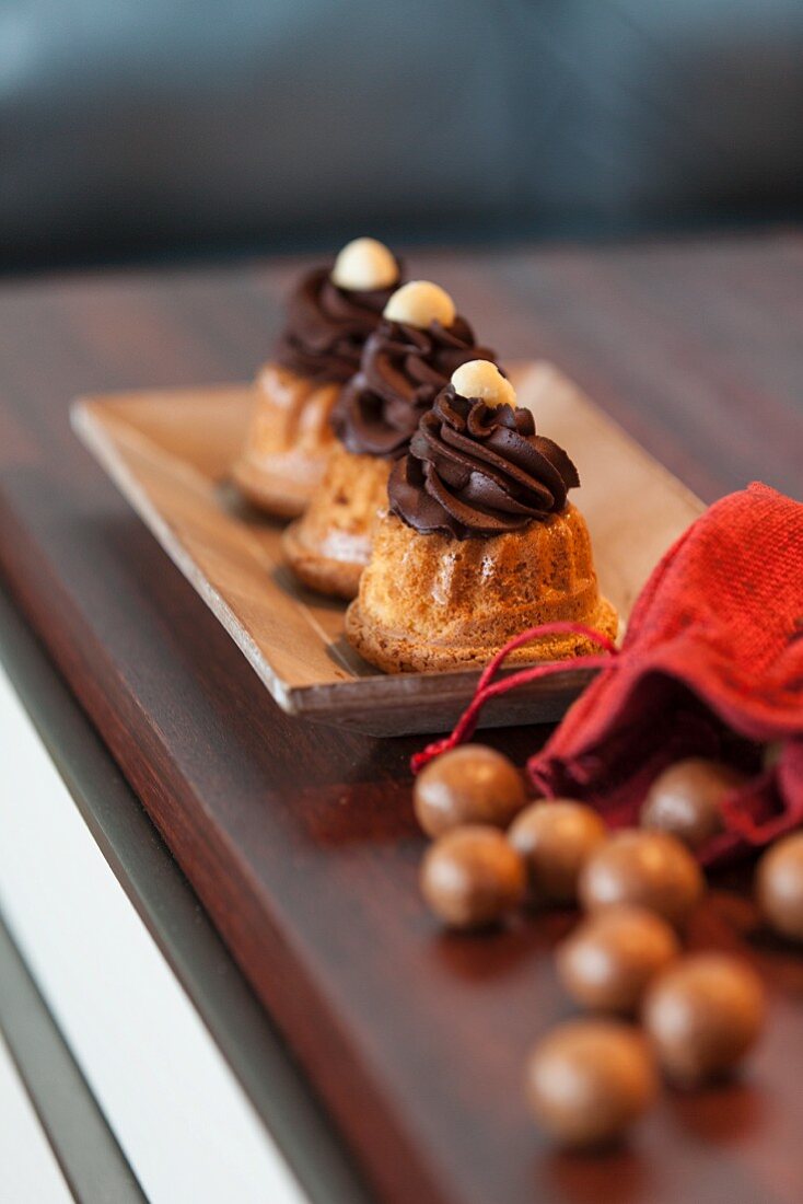 Mini Bundt cakes with chocolate cream and pralines