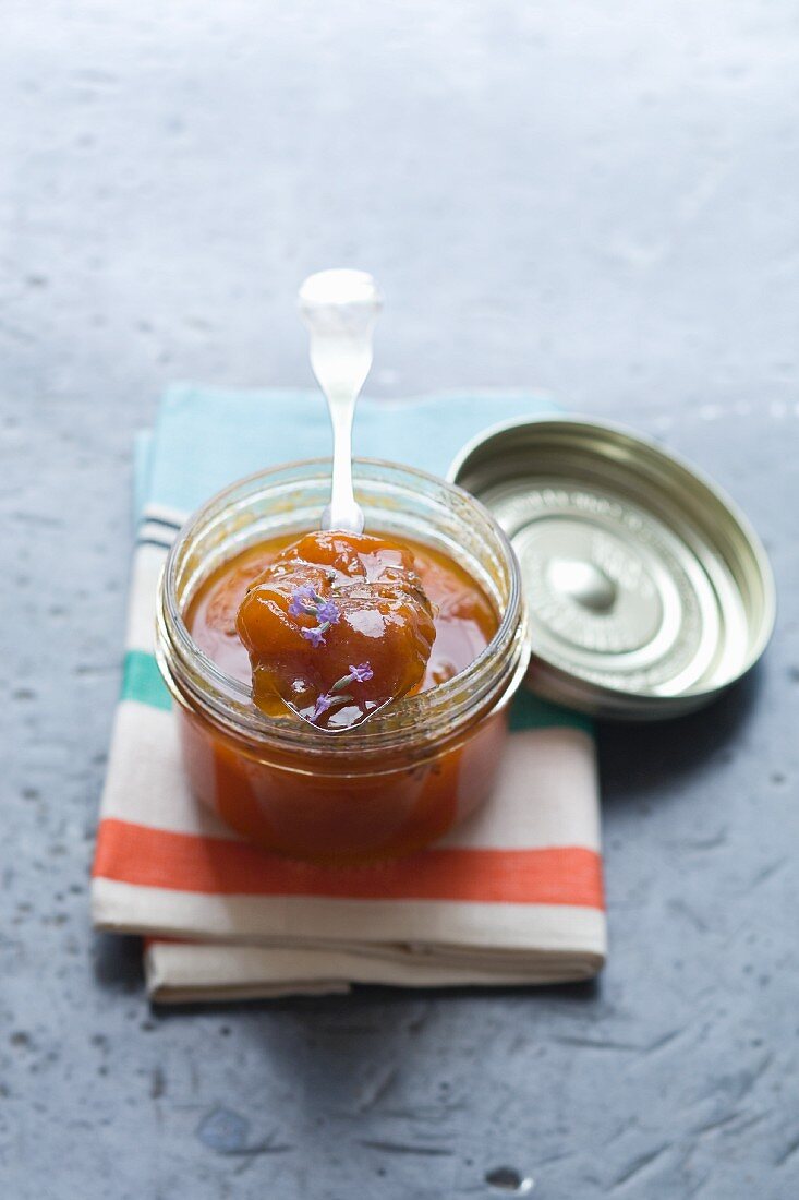 Apricot jam with lavender flowers