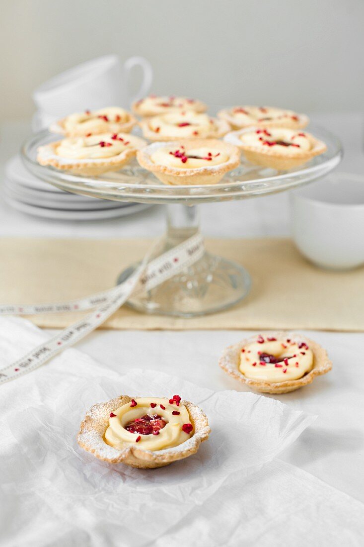 Tartletes on a cake stand.