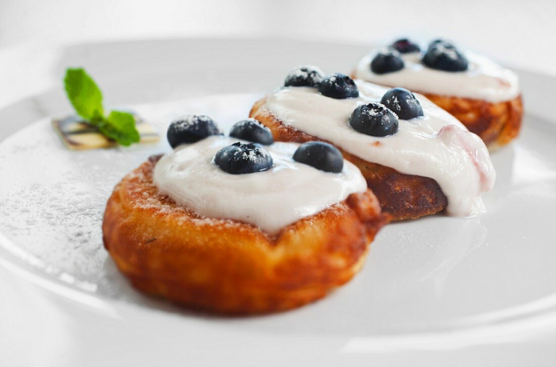 Czech pancakes with blueberries and cream