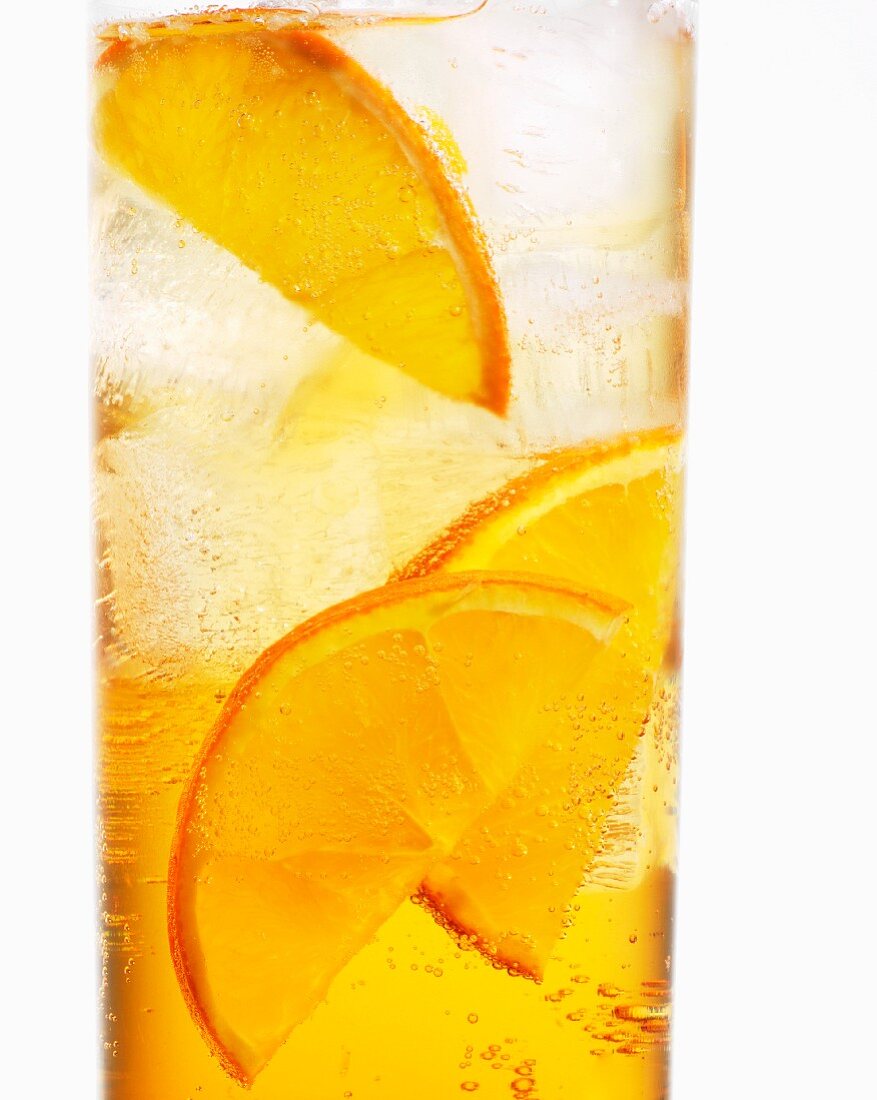A glass of Aperol with orange slices (close-up)