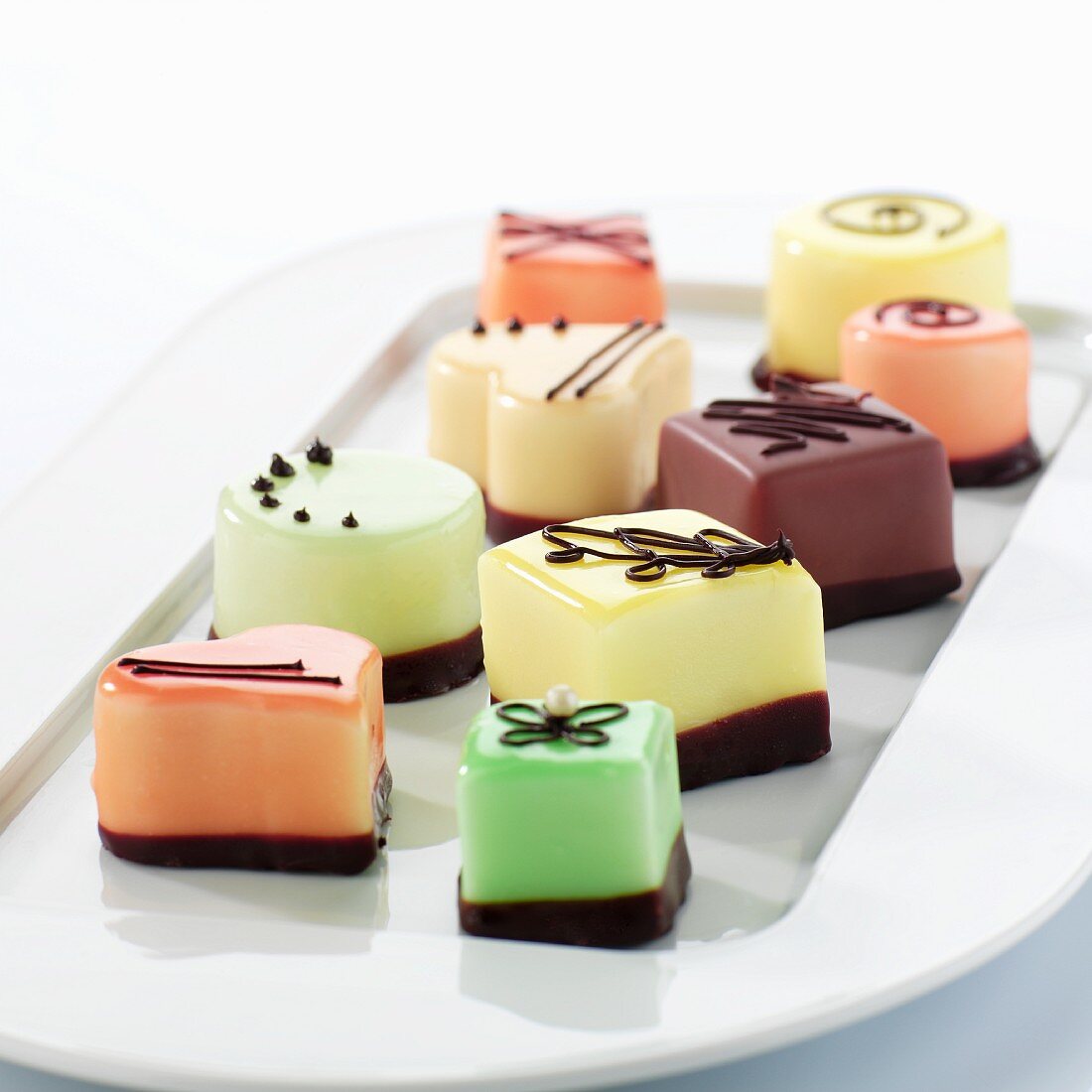 Assorted petit fours on a serving plate