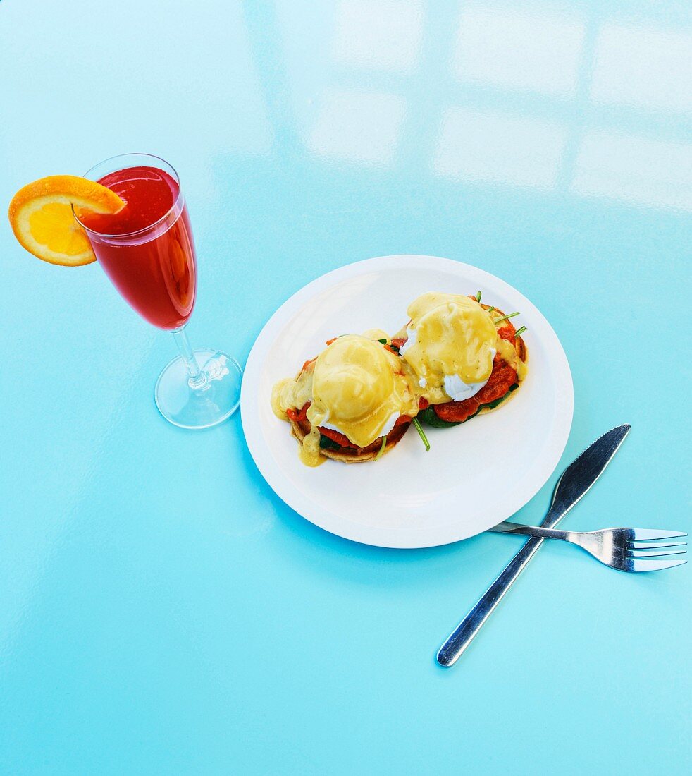 Eggs Benedict with Salmon and Red Mimosa Cocktail, High Angle View