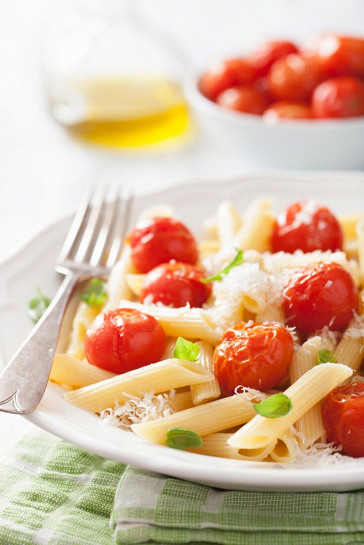 Penne with roasted cherry tomatoes, Parmesan cheese and basil