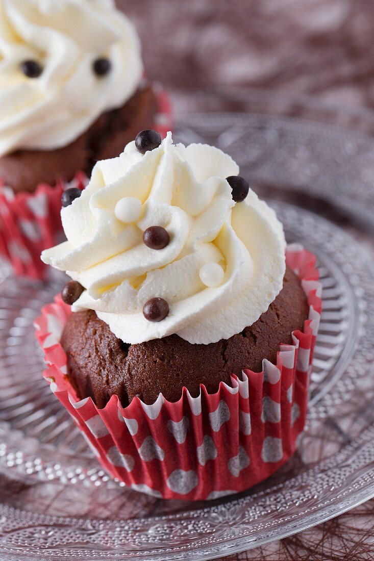 Chocolate cupcakes decorated with chocolate pearls