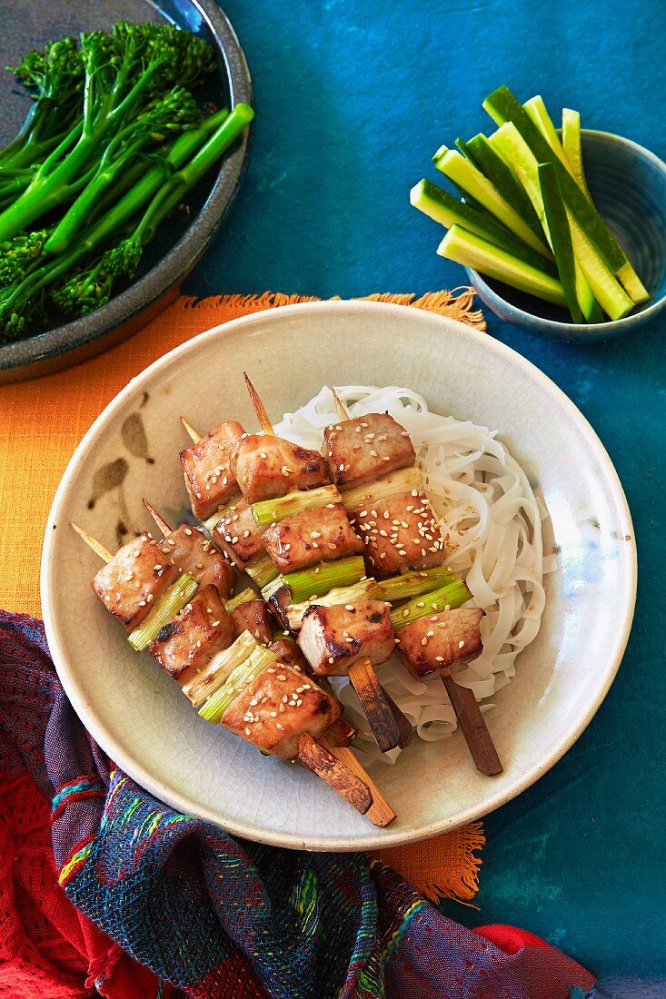 Chinese pork kebabs with rice noodles