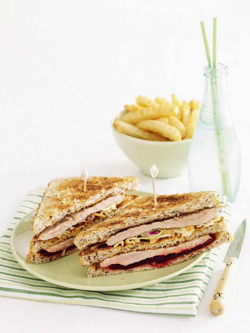 Triple-decker pork and slaw sandwich