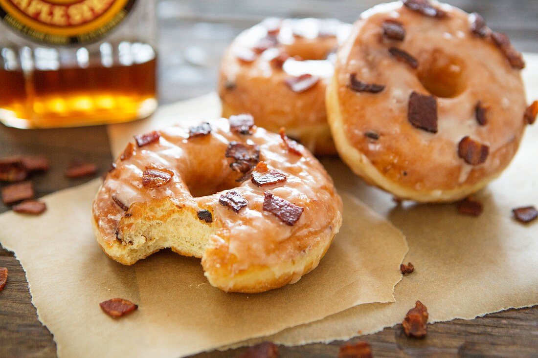 Glazed doughnuts with bacon bits