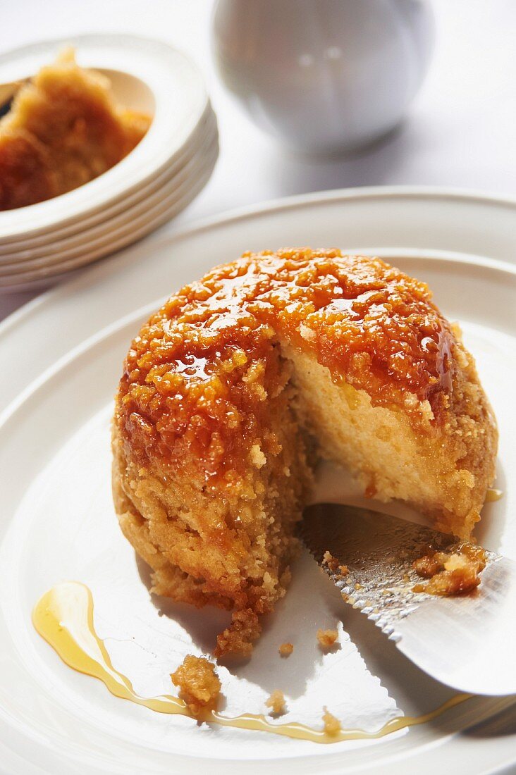 A steamed syrup pudding, sliced