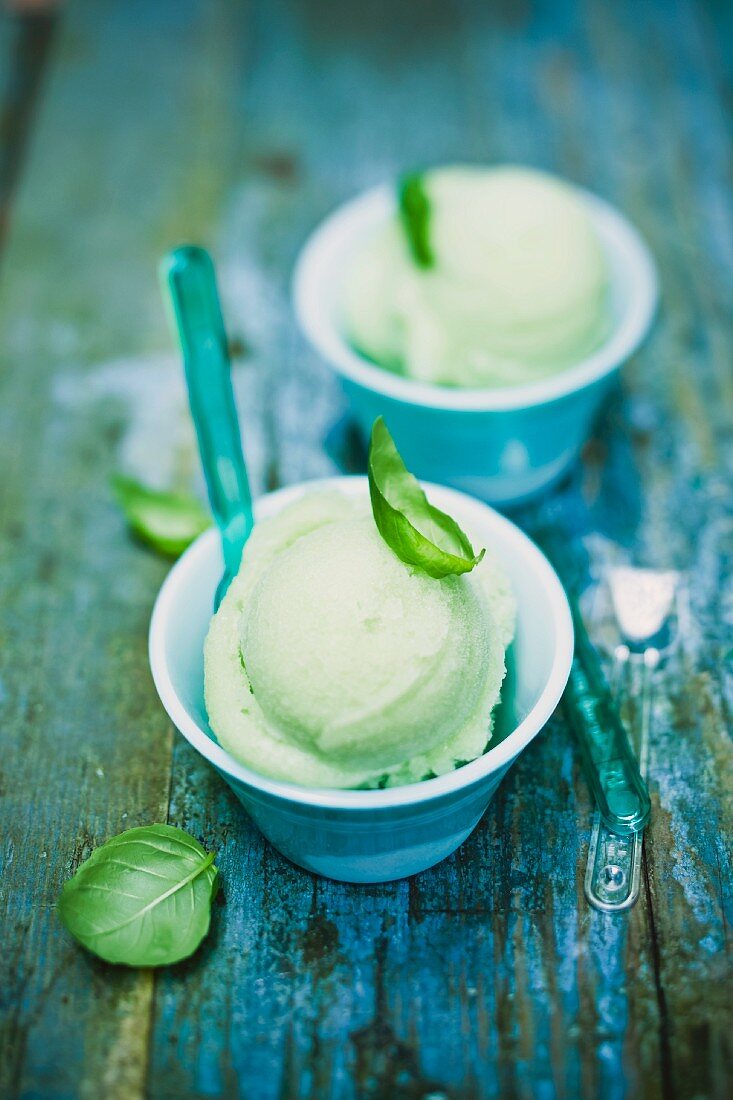 Basil ice cream with fresh basil leaves